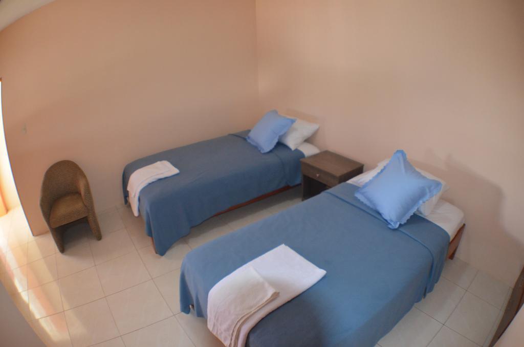 Hostal Tongo Reef Пуэрто-Бакерисо-Морено Номер фото